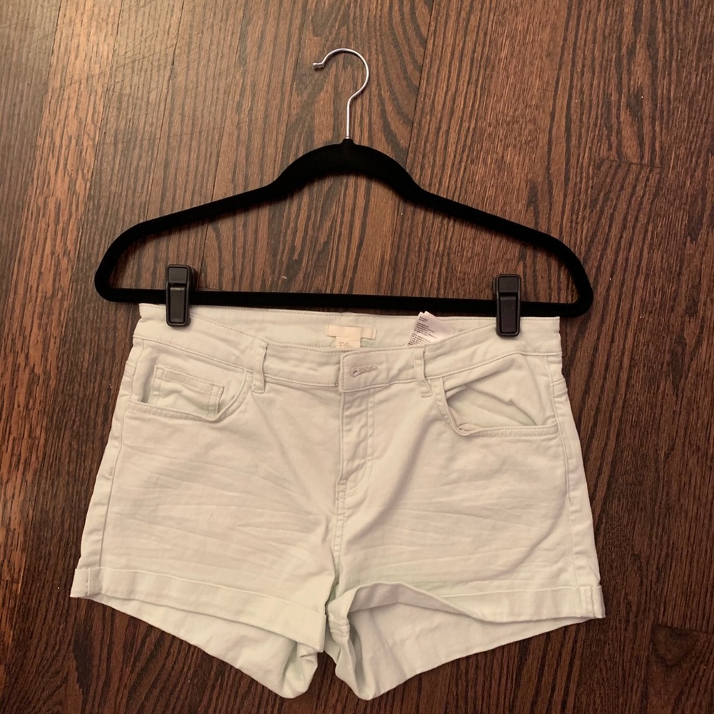H&M mint colored jean shorts